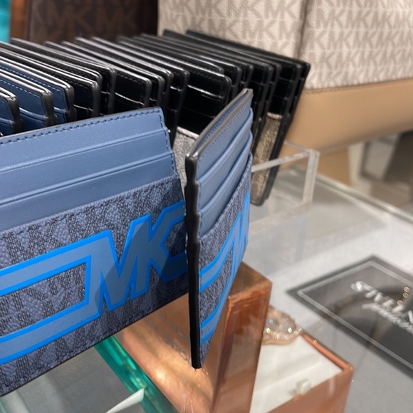 Michael Kors Cooper Graphic Logo Tall Card Case Denim Multi 36S3LCOD2B
NWT - Picture 9 of 16